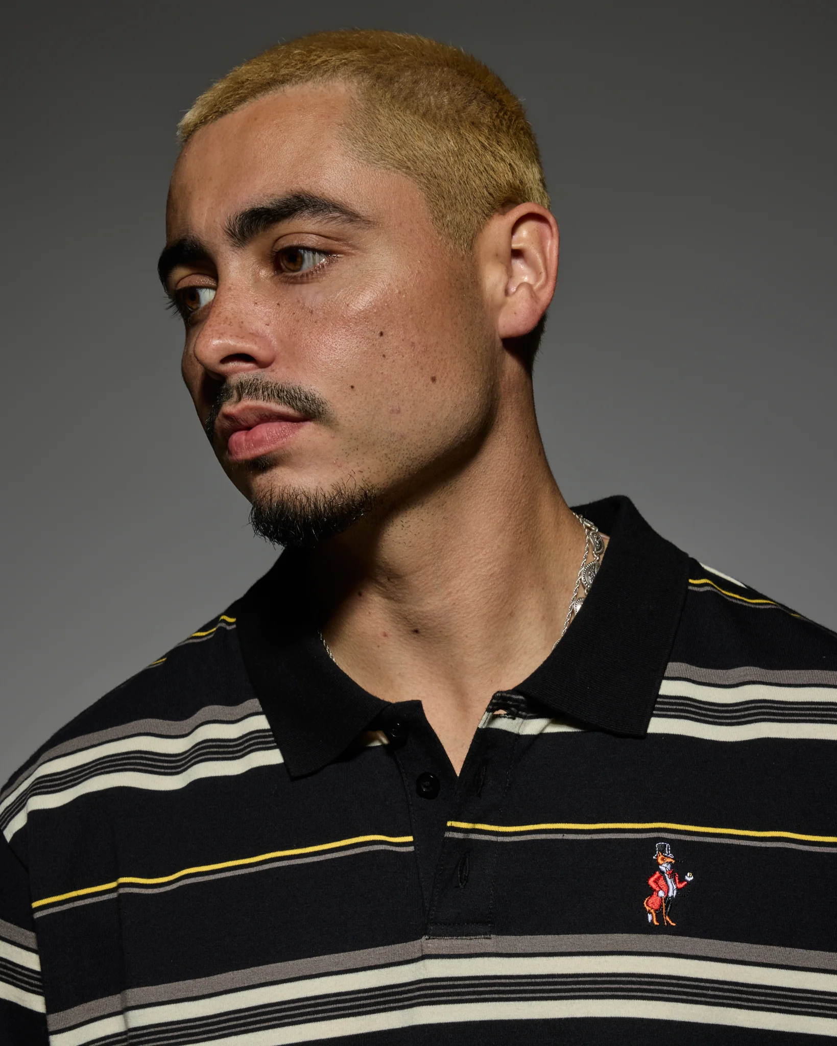 CHARLIE BROWN POLO SHIRT: BLACK / GOLD / CREAM - Image 4