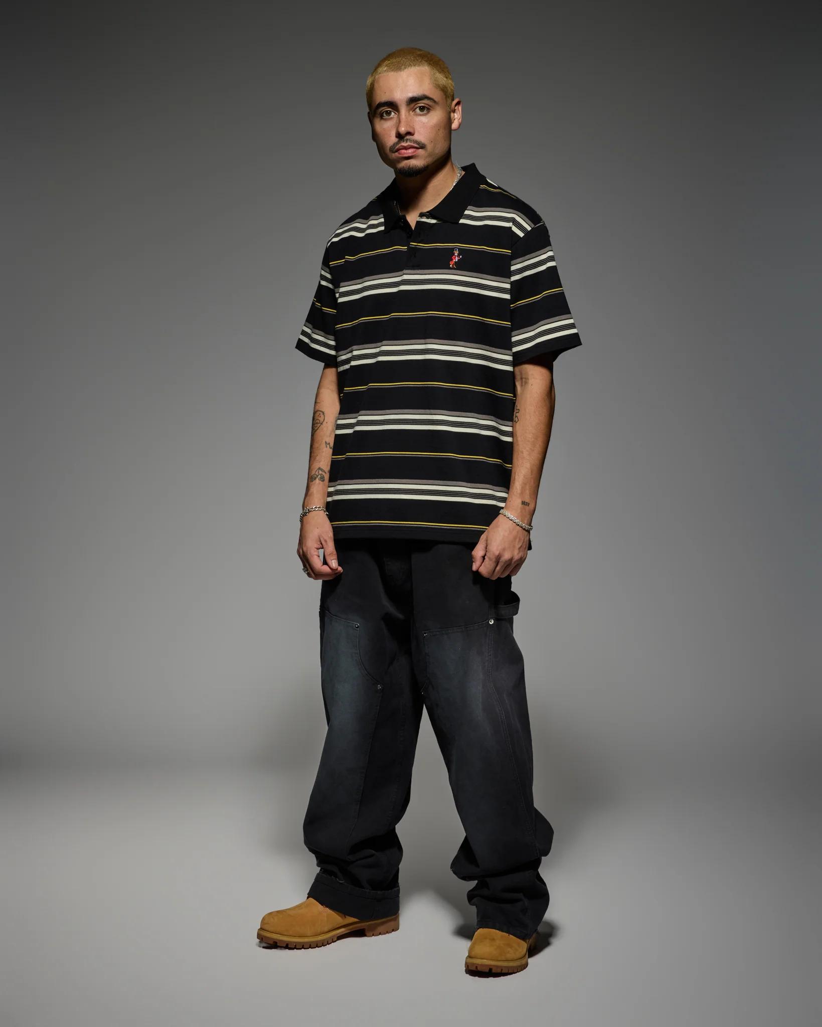 CHARLIE BROWN POLO SHIRT: BLACK / GOLD / CREAM - Image 6